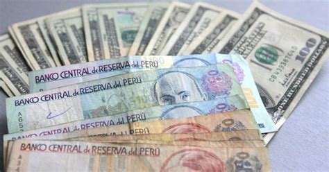 cuánto es 1 dólar en soles peruanos